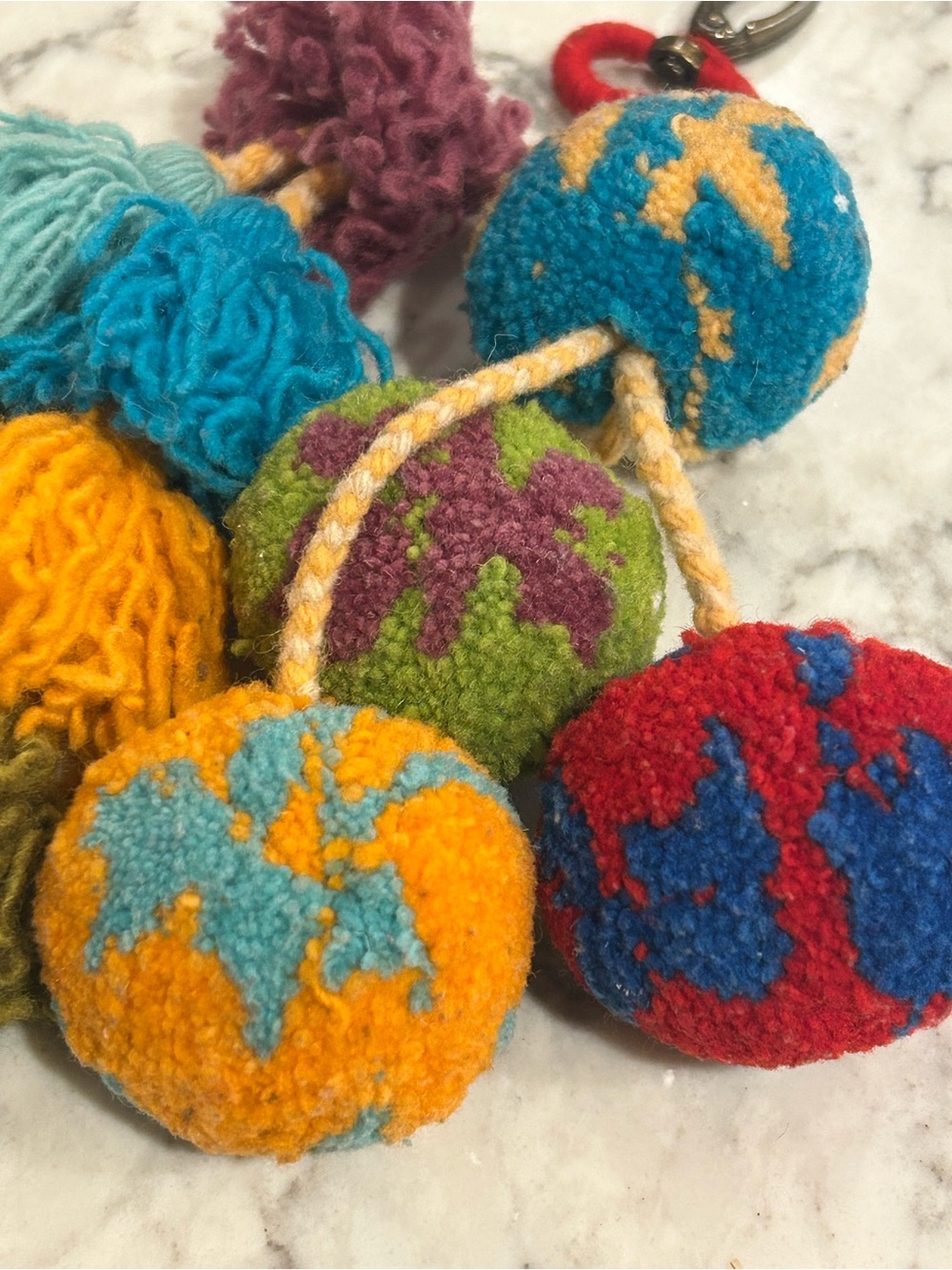 Noonday Collection Vibrant Pom Tassel Bag Charm - Picture 7 of 7